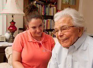 Care-Dimensions-nurse-case-manager-Ana-Sanderson-with-male-hospice-patient